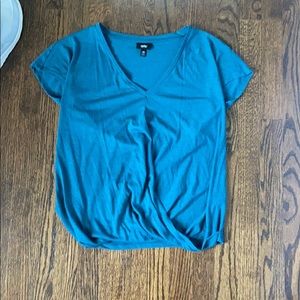 Xs teal t shirt with cross over bottom